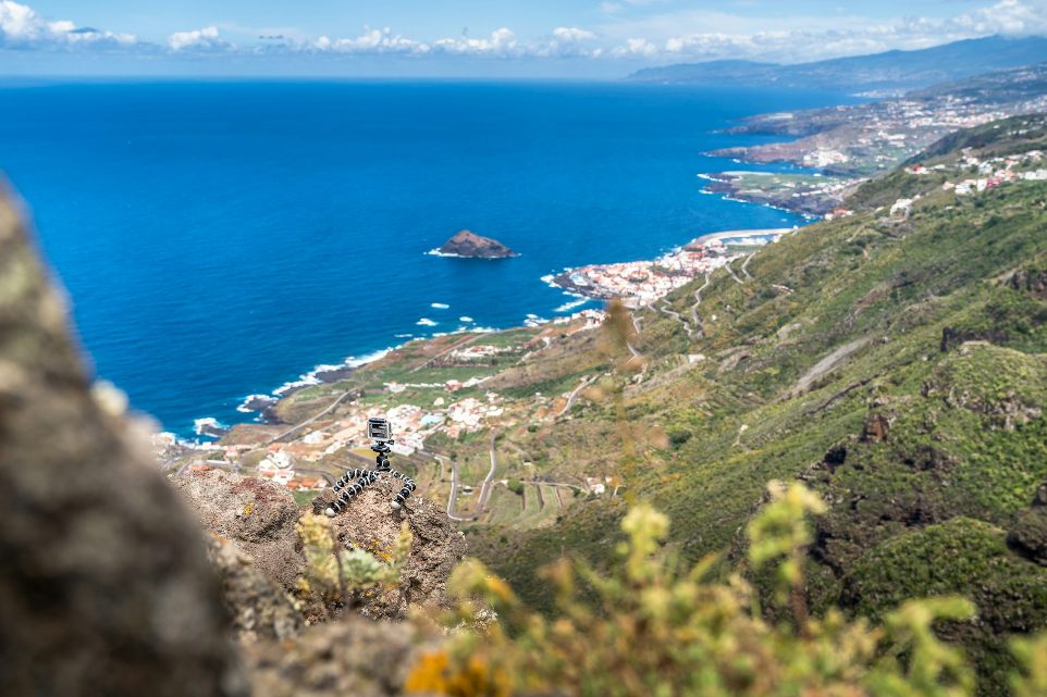 a view of the ocean from a hill top